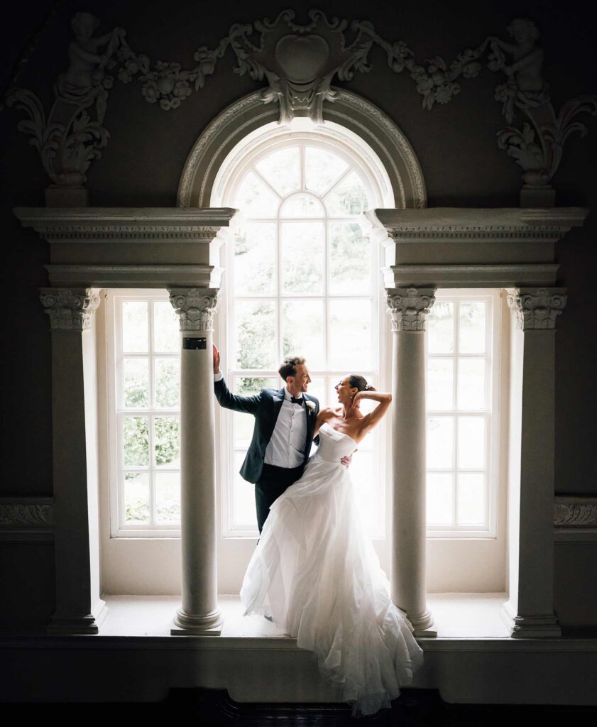 Bride and groom standing in the big window at crowcombe court wedding
Paul aston photography
Somerset wedding photographer