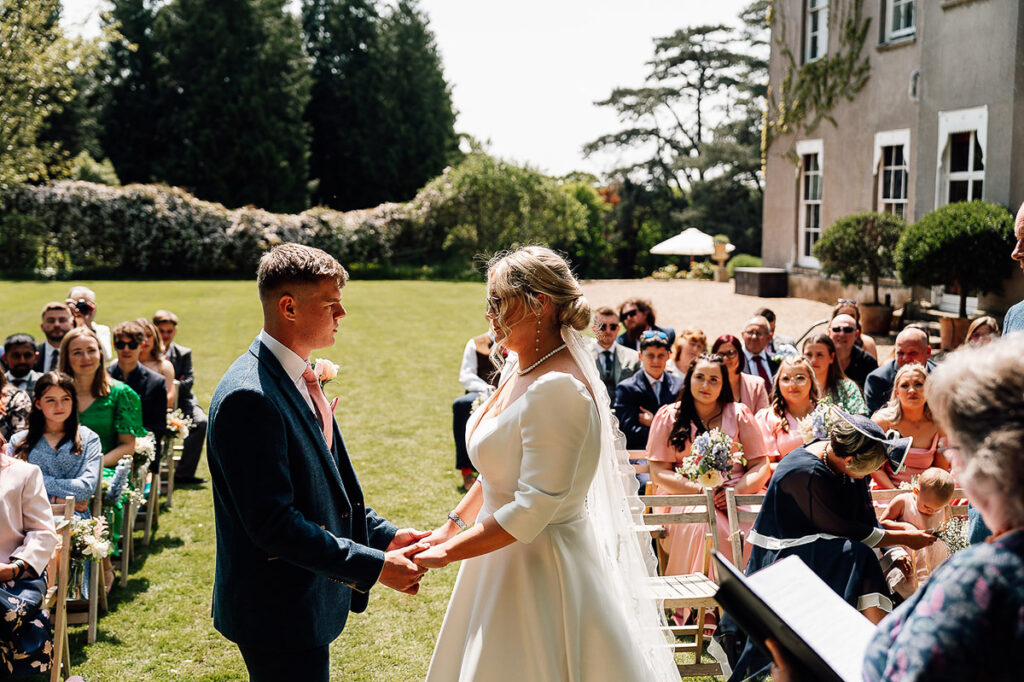 Pennard house wedding: bride and groom at the alter